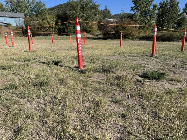 Site staked out and roped off last fall, ready for excavation.