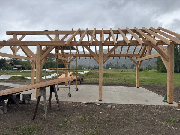 Another view from the east facing west, showing the rafters going up over the slab.
